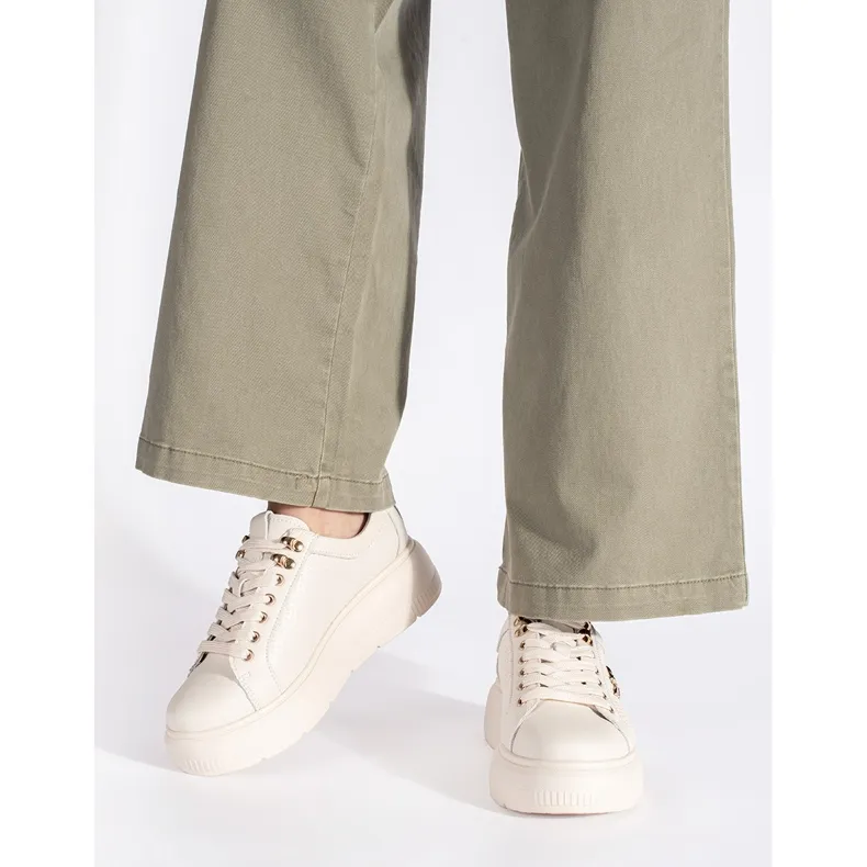 Beige leather sneakers on the platform white