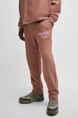 Cotton-terry tracksuit bottoms with logo print