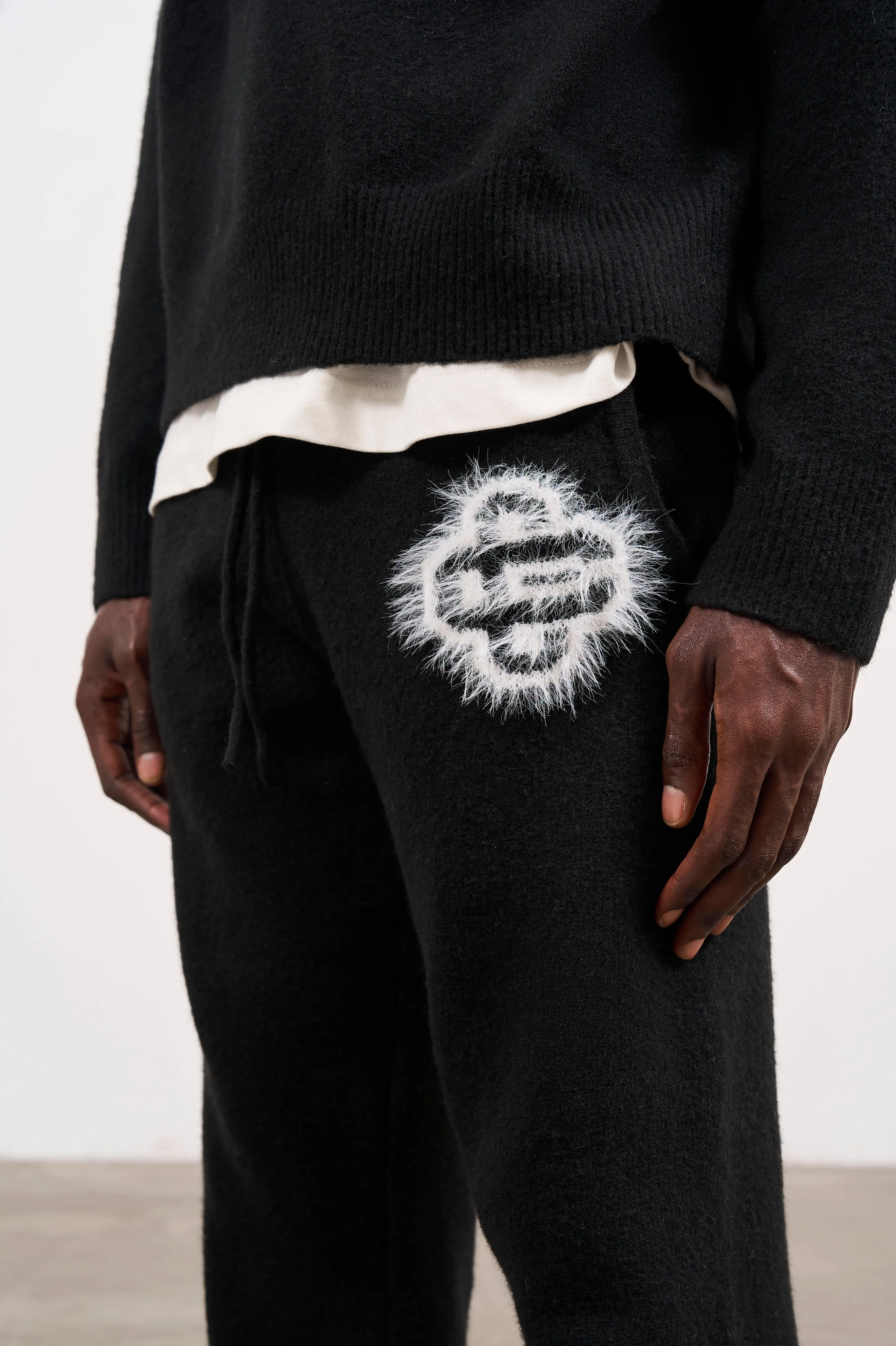 FLUFFY EMBLEM KNITTED JOGGERS - BLACK