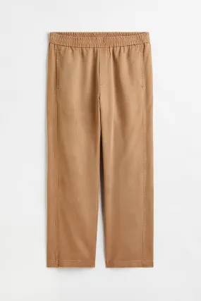 Loose Fit Lyocell joggers - Regular waist - Long - Beige - Men | H&M GB