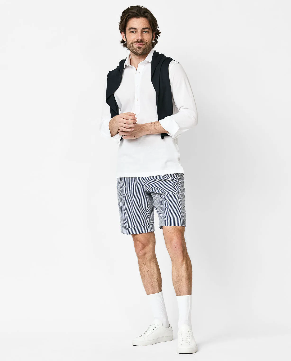 White popover, seersucker stripe shorts, & sneakers