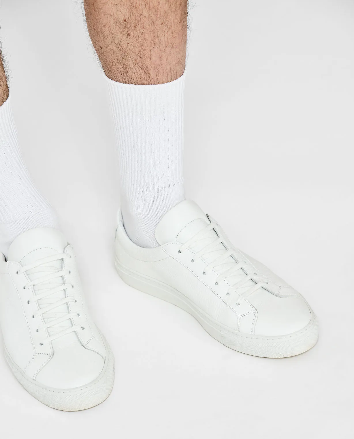 White popover, seersucker stripe shorts, & sneakers